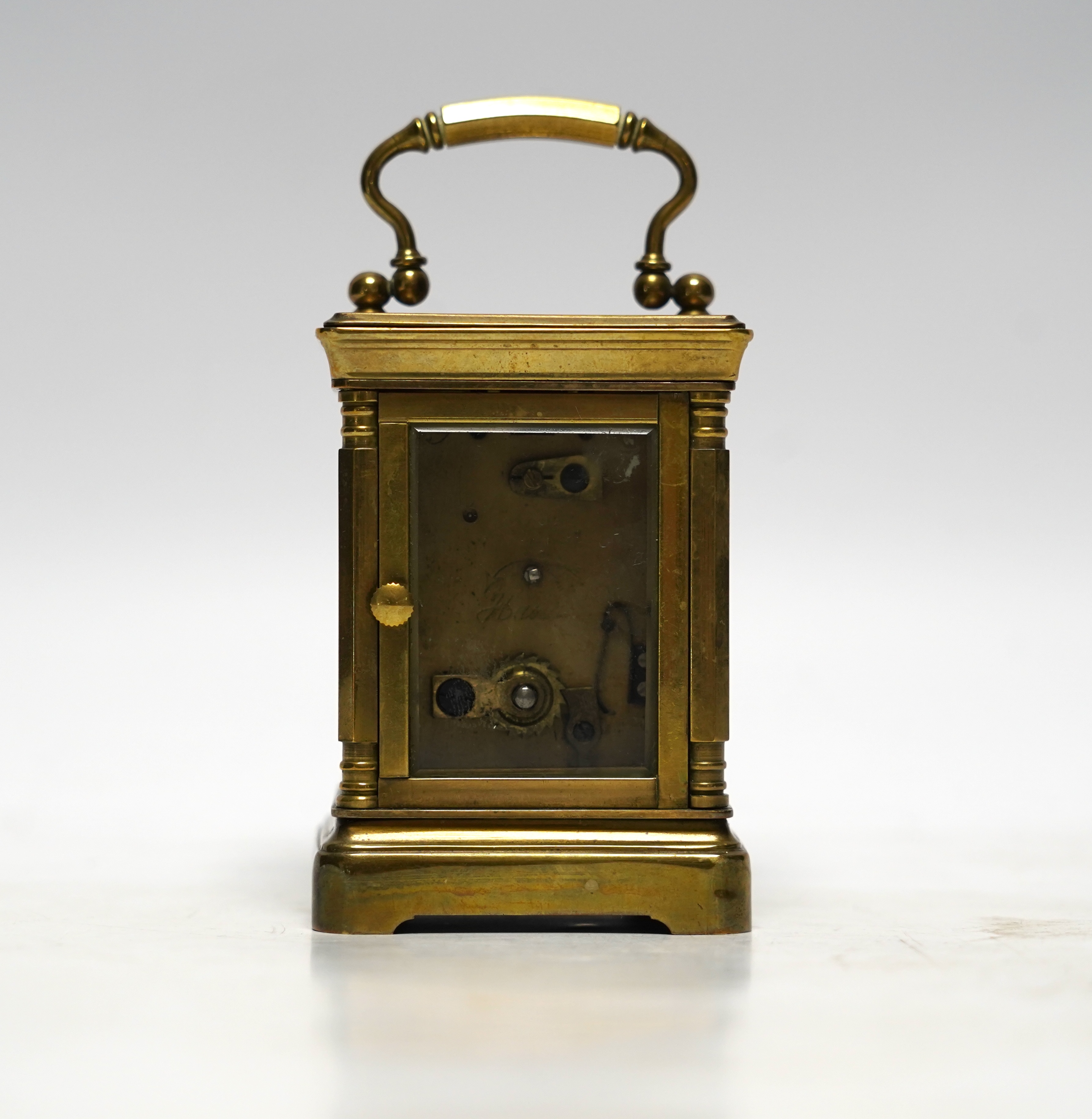 A miniature French brass carriage clock, with champlevé enamel panels, face signed Elliott & Son, London, 8.5cm